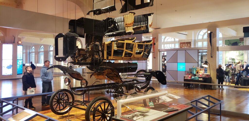 Model T Car Parts hanging from the ceiling at Henry Ford Museum in Michigan