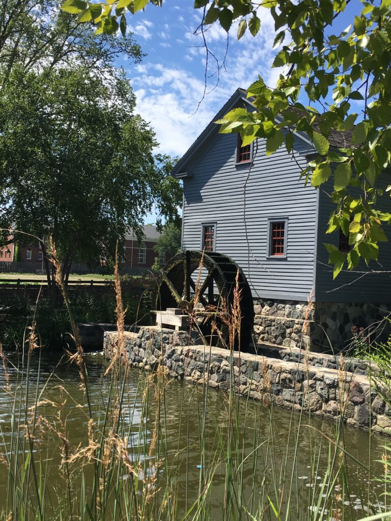 A mill and small river at Greenfield Village, an interactive history section at The Henry Ford Museum