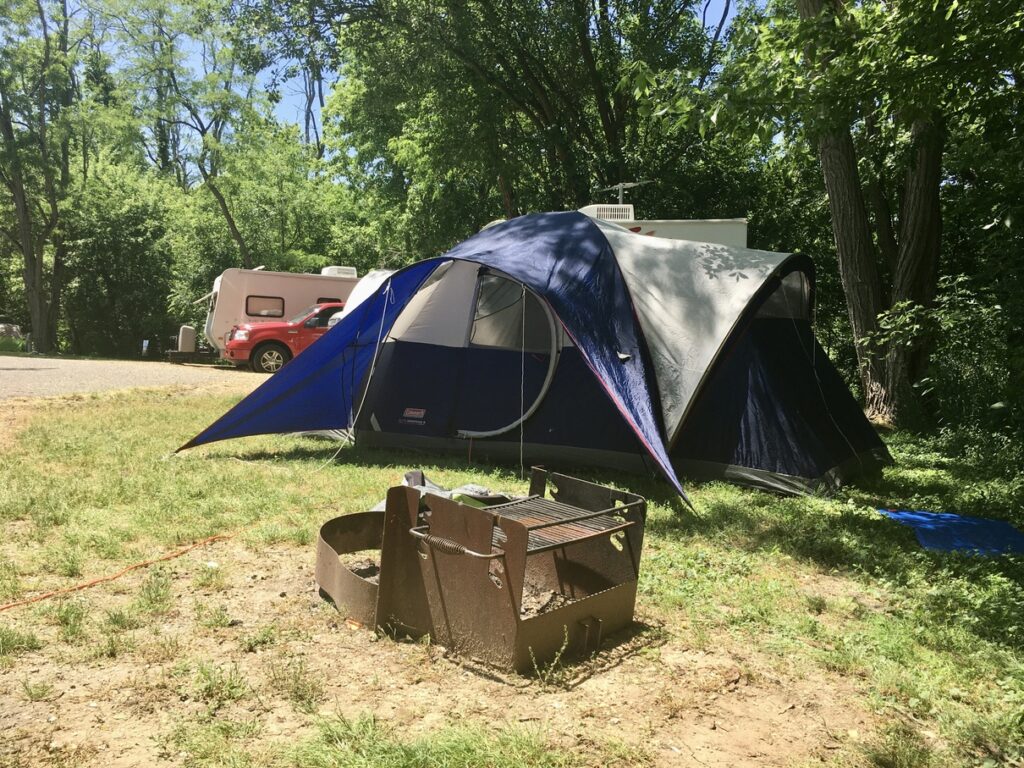 A tent and campfire spot in Salamonie Lake campground in Indiana