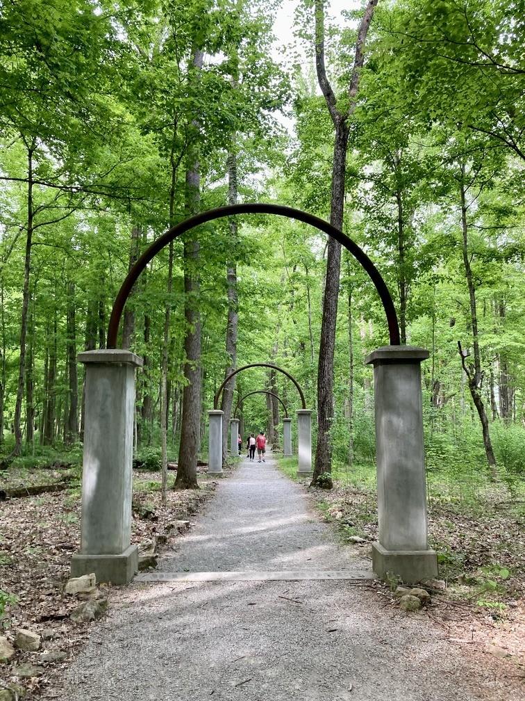 A series of arches welcome visitors into Rose Island at Charlestown State Park