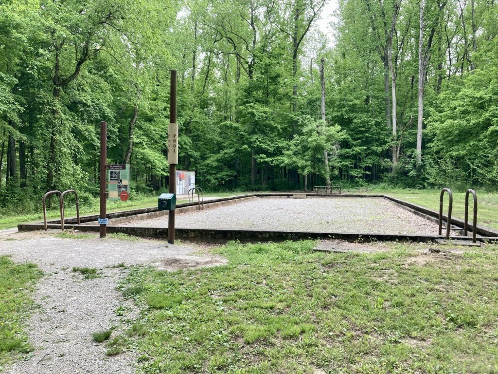 The abandoned pool gives visitors to Rose Island a better understanding of the flooding damage