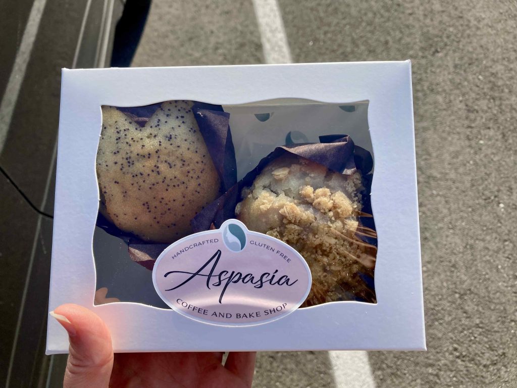 Two big muffins inside a box from Aspasia, one of a few gluten free and dairy free bakeries near Indianapolis