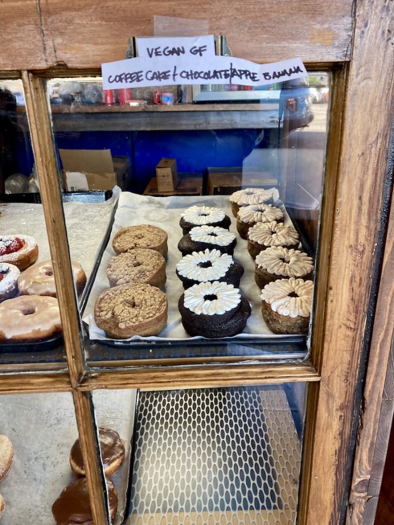 Photos of three gluten-free and dairy-free donuts at Bigmouth Donuts in Cleveland
