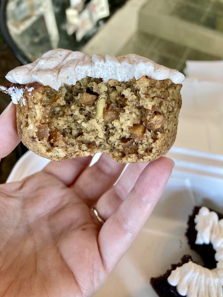 The inside of the banana apple donut has pieces of apple with a vanilla whipped frosting on top.. one of the gluten-free donuts at Bigmouth Donuts